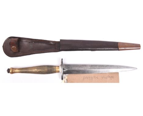 A WWII 2nd Pattern FS fighting knife, blade etched with “Wilkinson Sword London and the FS Fighting Knife”, in its scabbard (