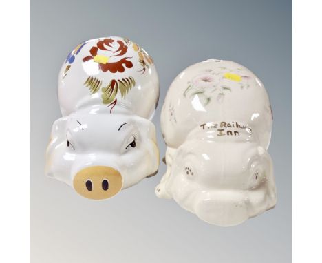 Two late 20th century oversized ceramic pig money boxes 