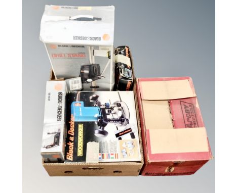 A box of Black and Decker wood worker, jigsaw, hammer drill and drill stand, all boxed, Arcoy Dovetailer boxed 