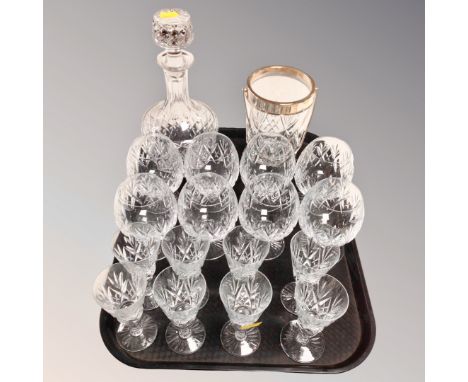 A tray of eight lead crystal brandy and liqueur glasses, further decanter and ice bucket 