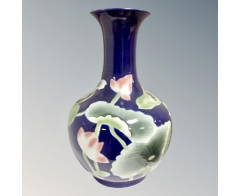 A glazed ceramic bulbous floor standing vase, height 58 cm