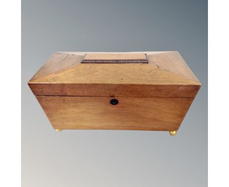 A 19th century mahogany sarcophagus tea caddy  