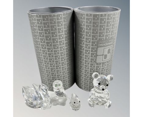 A Swarovski crystal teddy bear and swan figure, boxed, together with two further Swarovski figures of a Rabbit and Owl. (4)