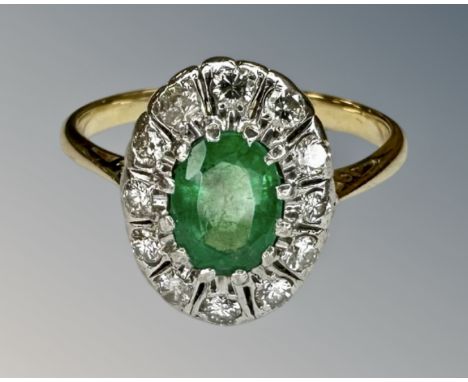 An antique 18ct gold emerald and diamond cluster ring, size O.