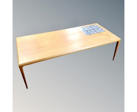 A 20th century Danish Silkeborg teak coffee table with tiled inset panel 