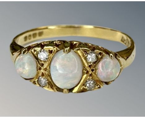 An antique 18ct gold opal and diamond ring, size L.