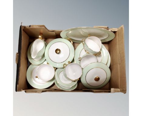 A box of Imperial China tea and dinner ware with 22ct gold finish 