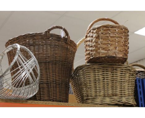 A group of vintage wicker baskets .