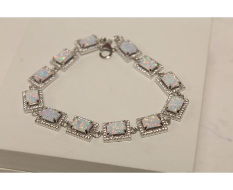 An impressive Silver and opal panelled bracelet
