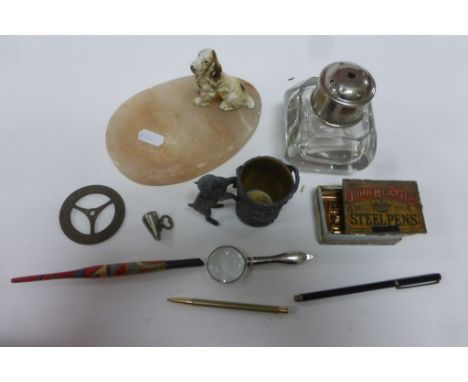 A tray of sundries to include inkwell , match holder spelter dog ashtray etc.
