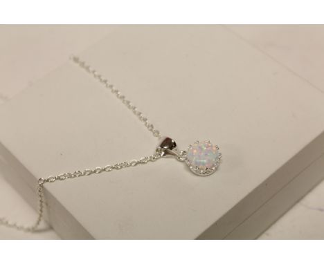 Silver and opal pendant necklace on silver chain