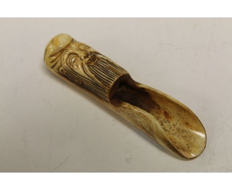 Bone scoop spoon / apple corer with God of Longevity to handle