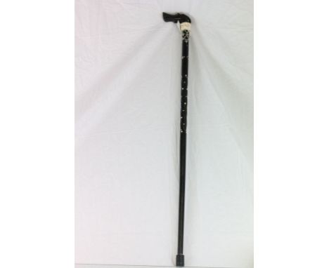 An ebonised and ivory dog head walking stick