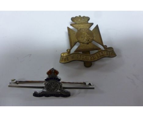 Silver and enamel Royal Artillery sweet heart brooch or tie pin plus a Wiltshire Regiment cap badge