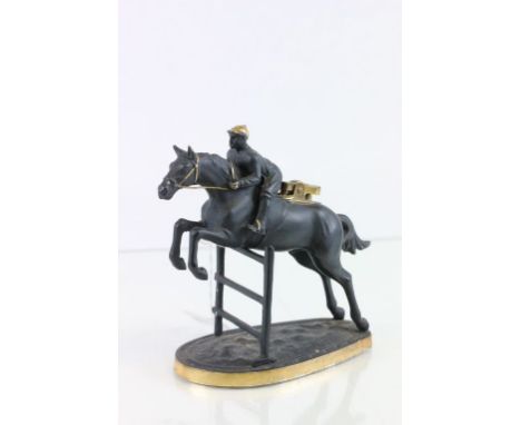 Vintage table lighter of a horse and jockey