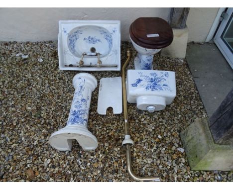 White Ceramic decorated with Blue Floral Sprays Cloakroom Suite comprising Basin on Pedestal and Toilet with Overhead Cistern