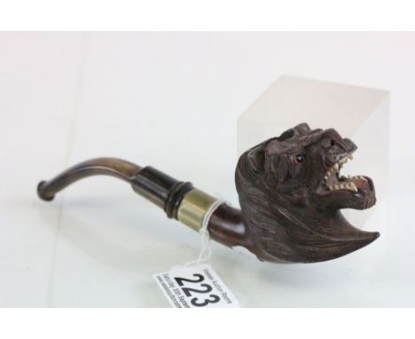 A vintage carved lion head pipe