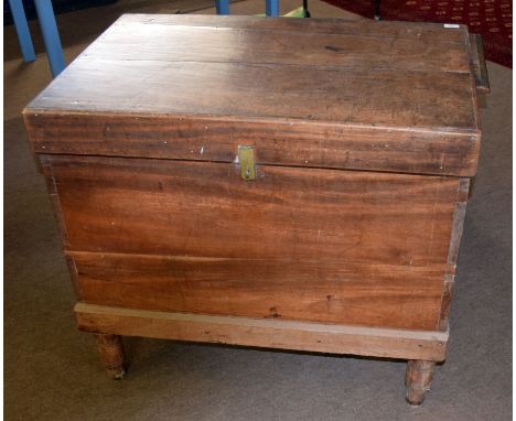 19th century mahogany storage trunk with later stand, the hinged lid opening to reveal a plain interior, currently holding a 