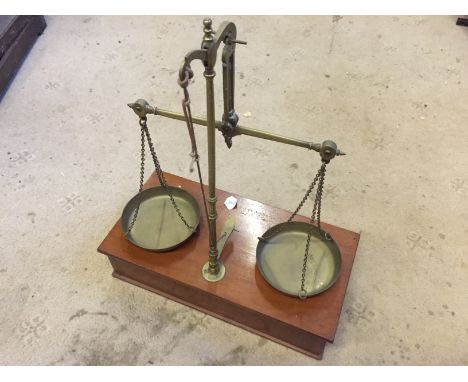 A set of jewlers / goldsmiths scales and weights.