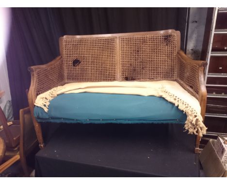 A bergere sofa for restoration.