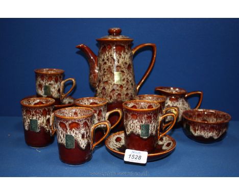 A Fosters South West part Coffee set with large coffee pot, six saucers, mugs, sugar bowl and jug in mottled brown colour.