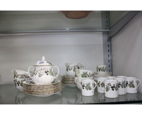 A Royal Worcester Tea/Coffee service in Lavinia pattern, comprising six tea cups and saucers, eight tea plates, eight coffee 