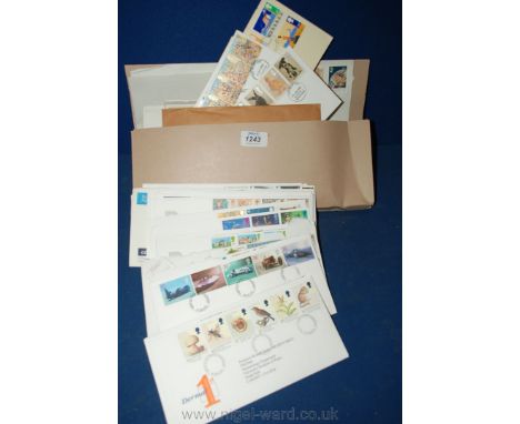 A quantity of first day covers to include Endangered Species, Enid Blyton, Channel Tunnel, Rugby League Players, Christmas et