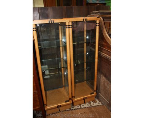 A pair of reproduction deco style display cabinets, burr walnut finish tops with turned column supports with glass back, side