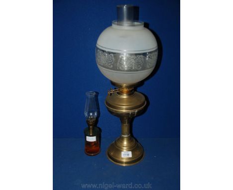 Two Oil Lamps, one with brass column and white shade 22'' high, plus a smaller 10'' Lamp with glass base.