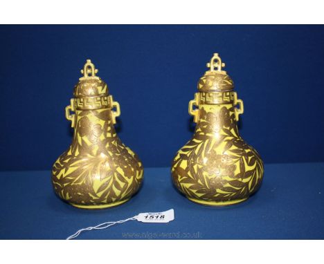 A pair of unusual circa 1880 Derby Crown Porcelain chinoiserie style lidded jars of pear shape with all over gold foliage, fl