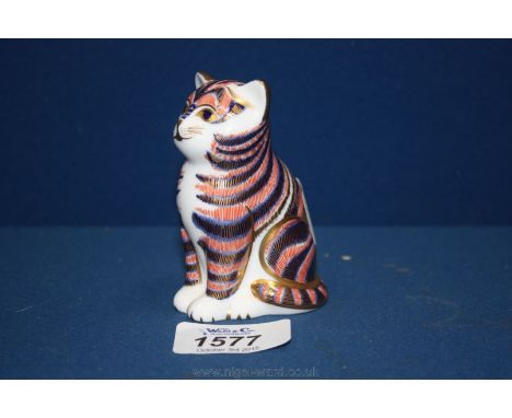 A Royal Crown Derby figure of a cat in a seated position, LlV marked with a green M and having gold stopper.  3 1/4'' high