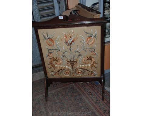 A wooden framed embroidered Fire Screen