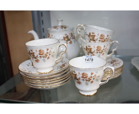 A part Colclough Teaset in 'Avon' pattern including six saucers and tea plates, four cups and a teapot.