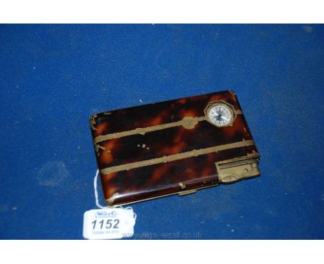 A collectable Austrian simulated tortoiseshell on brass Cigarette Case, the engine turned interior marked 'Seigneur', the cas