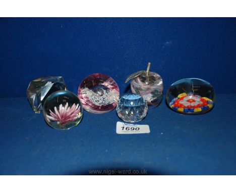 Six small Paperweights including an Isle of Wight apple, Caithness, Millefiori, etc