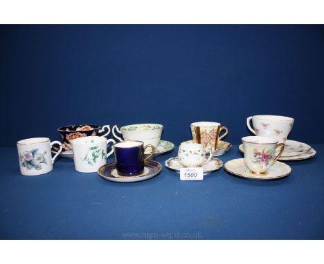 A quantity of cabinet Cups and saucers including Aynsley, Royal Albert, Duchess trio, Royal Worcester coffee can, etc.