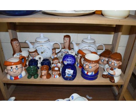 COLLECTION OF TETLEY TEA COLLECTABLES TO INCLUDE EGG CUPS, TEA POTS, FIGURES ETC