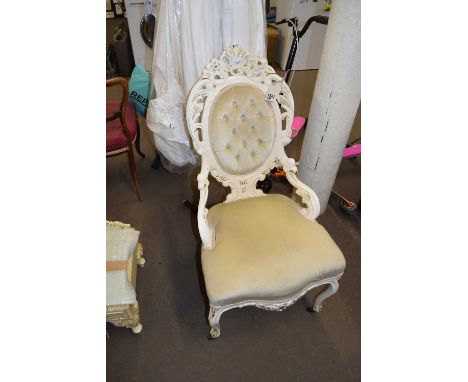 BUTTON BACK SIDE CHAIR WITH FLORAL CARVED FRAME
