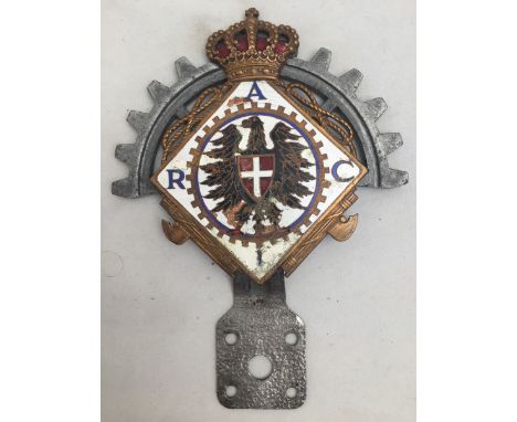 An unusual Continental part enamel car badge.