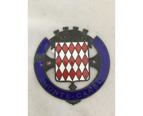 A Monte-Carlo part enamel car badge. 