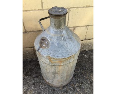 An Esso Petroleum Company Limited cylindrical conical five gallon drum. 