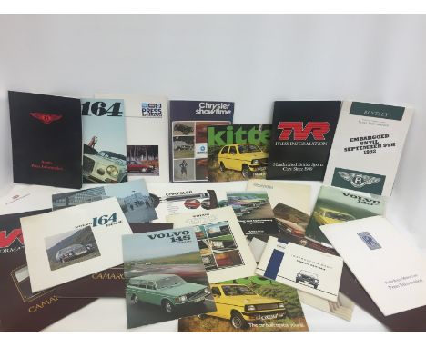 A collection of assorted sales brochures featuring various marques of car including the TVR, Volvo, Rolls-Royce and Bentley.