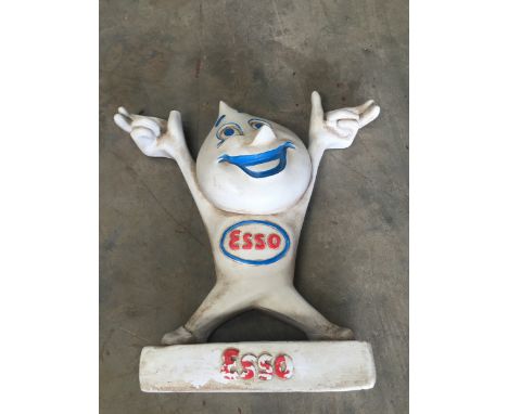 A reproduction Esso Mr. Drip plaster figure. 