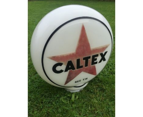 A Caltex glass petrol pump globe.