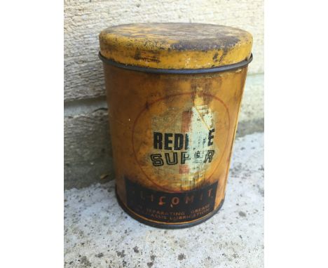 A Redline Super 1lb grease tin, with globe motif to the front. 