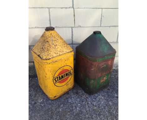 A Staminol five gallon pyramid can and an Agricastrol Tractor Oil five gallon pyramid can.