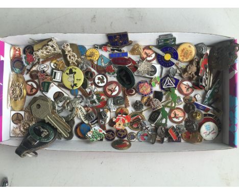 A good collection of enamel and other lapel badges, AA keys, cap badges etc.