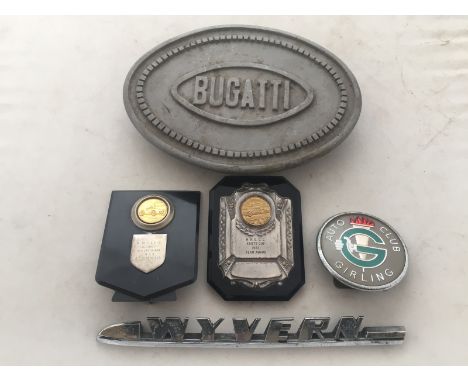 An oval resin Bugatti foot step, a Girling Auto Club car badge, a Wyvern chrome plated car badge etc.