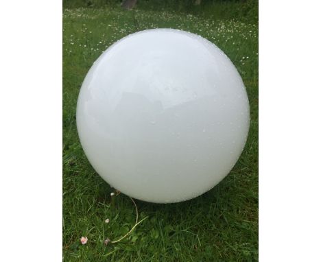 An opaque glass spherical globe shade with screw thread.