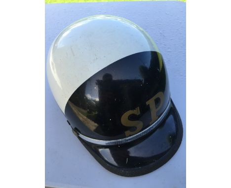 An American Patrolman's helmet. 